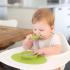 Обучителна силиконова купа с вградена вакуумна подлжка Ezpz 4 + месеца Tiny Bowl Lime