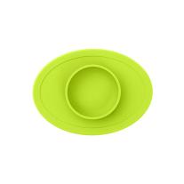 Обучителна силиконова купа с вградена вакуумна подлжка Ezpz 4 + месеца Tiny Bowl Lime