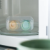Ортодонтични залъгалки Tommee Tippee NIGHT TIME, 0-6м, оранжева и зелена с декор луна, в кутия за стерилизиране