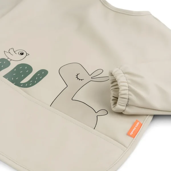 Sleeved-pocket-bib-Lalee-Sand-Detail-2 Sleeved-pocket-bib-Lalee-Sand-Detail-2
